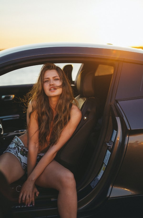 A sexy girl in a car