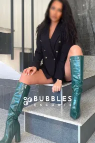 Anya showing you her wonderful legs in knee-high boots 